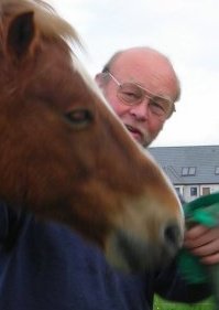 Brian with his favourite horse.  Brian is the IT man and chairman of the Trust.